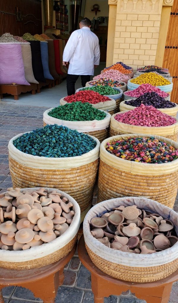 A picture containing table, sitting, rug

Description automatically generated